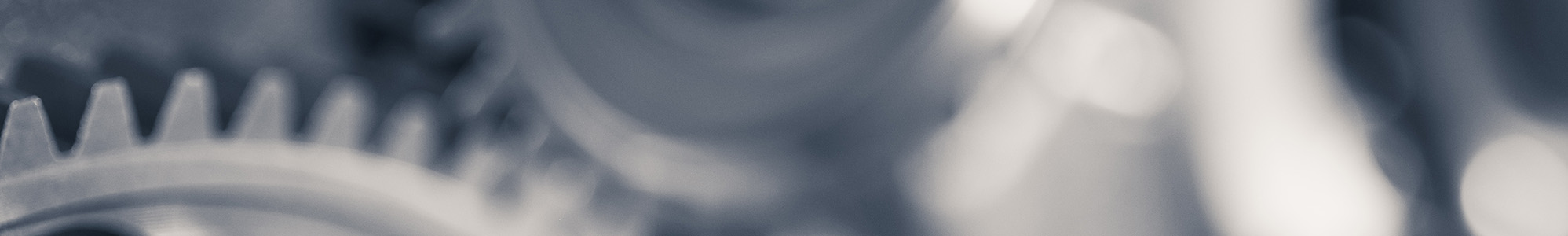 Eine abstrakte Nahaufnahme von Zahnrädern.